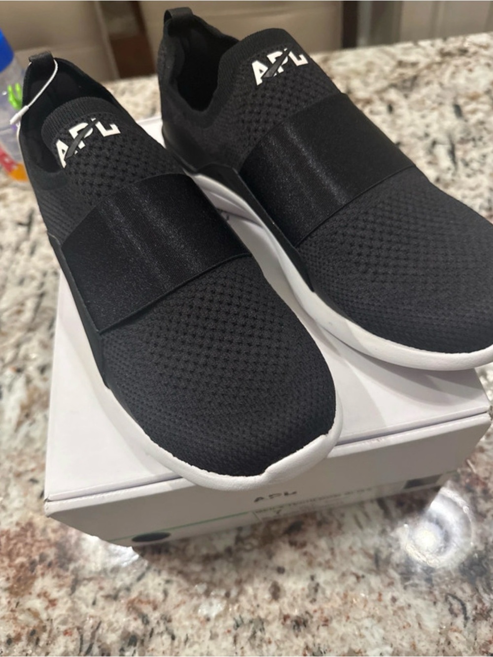 APL Women's Black and White Slip-On Athletic Sneakers